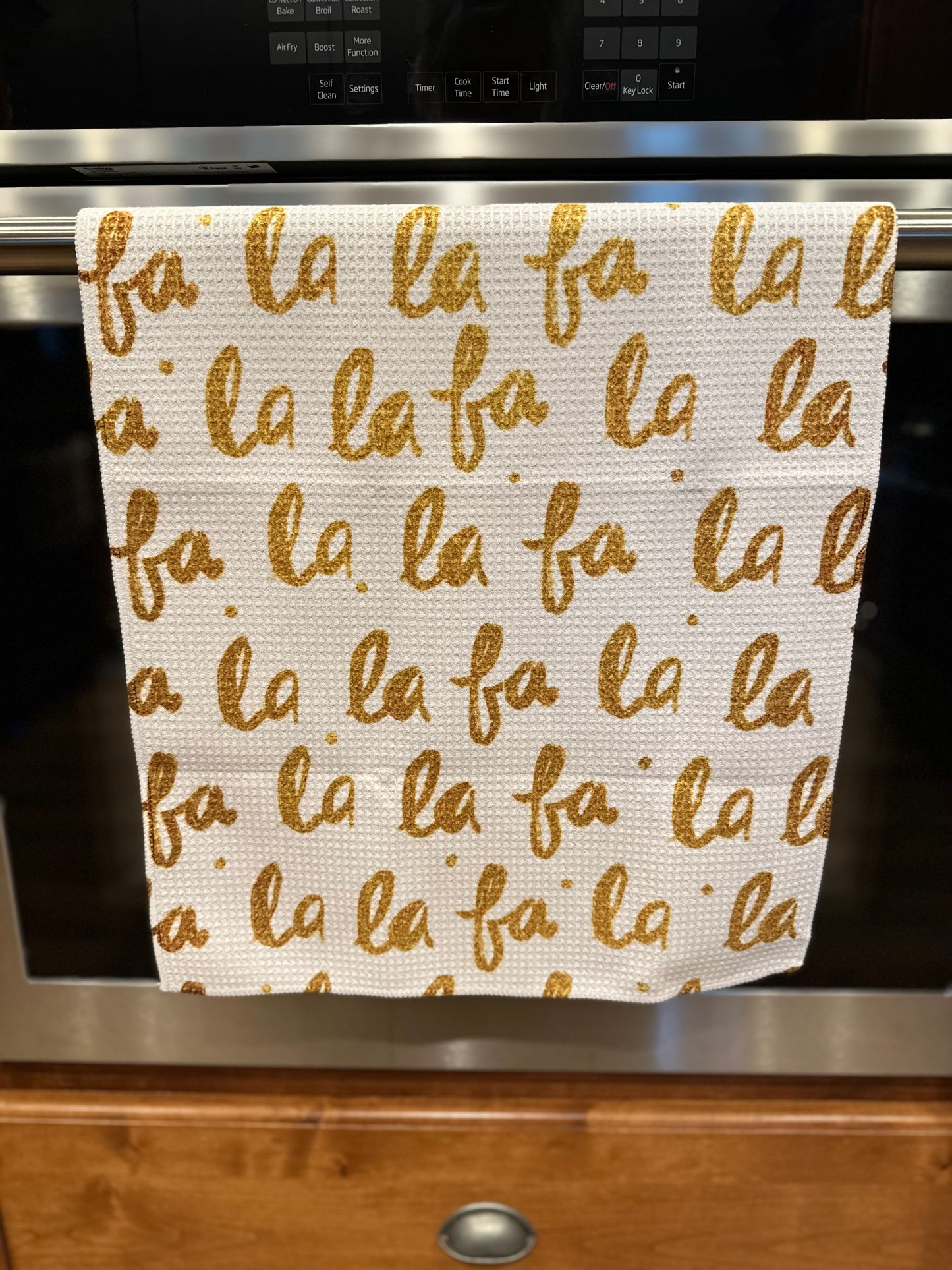 Fa La La La La Waffle Kitchen Towel