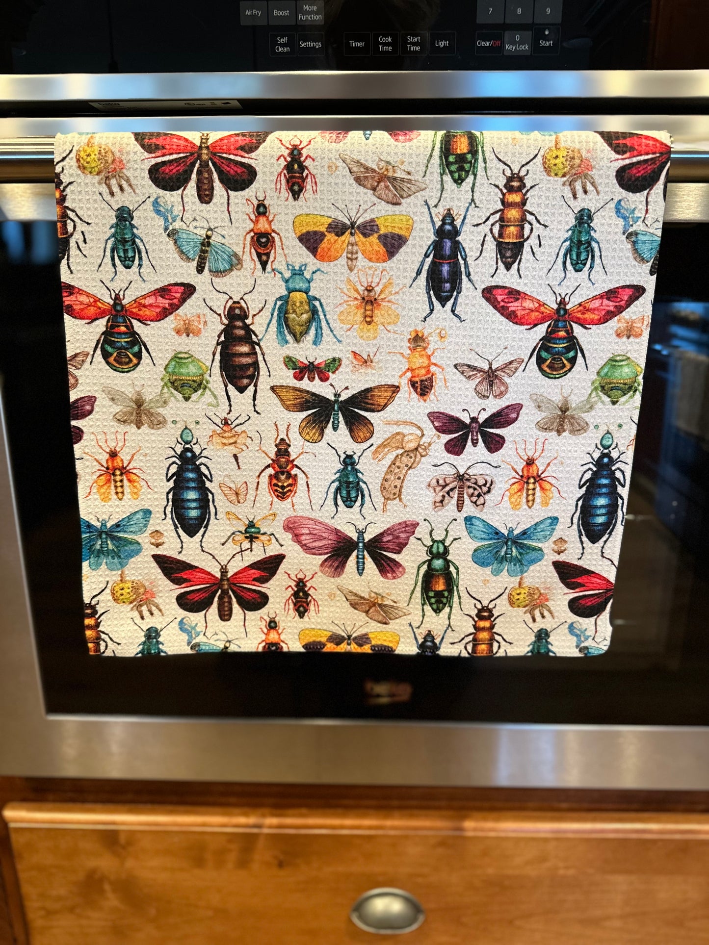 Whimsical bugs waffle kitchen towel